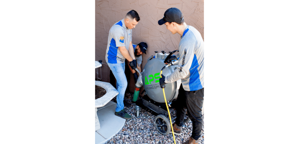 Southwest Pipe Technologies Mesa Arizona Trenchless Pipe Repair Technicians Installing Pipe Lining Outside of Home